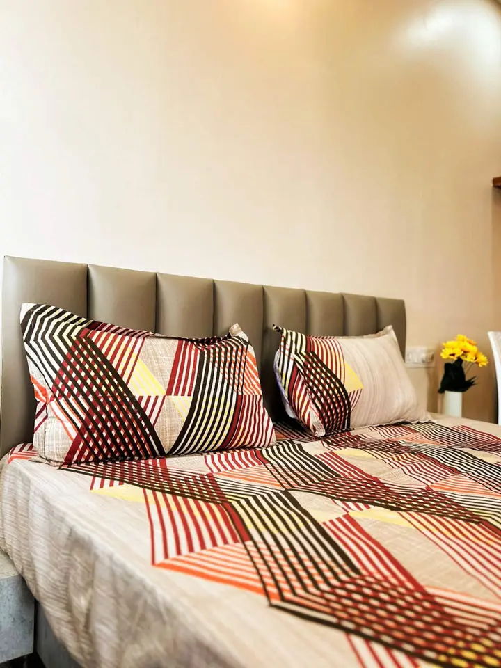 Queen bed with upholstered headboard